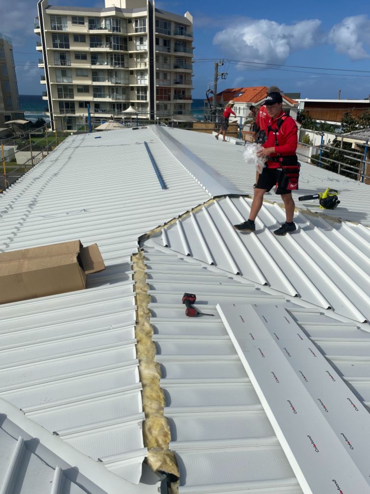 Installing Metal Roof — Ryan Roofing Australia In Court Carrara, QLD